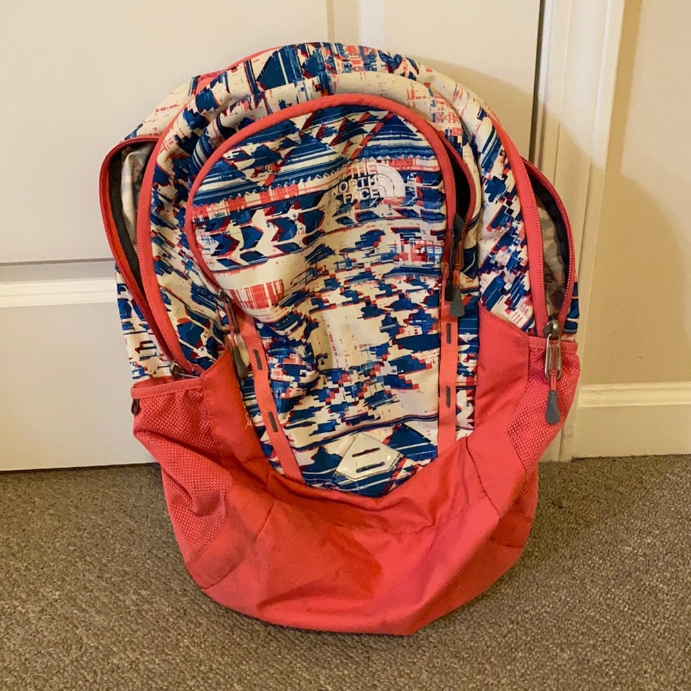 Pink north face back pack